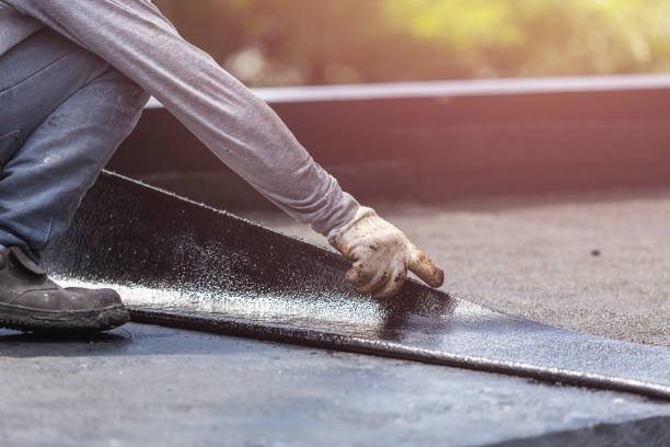 Professional Basement Waterproofing technician working in Dunkirk, MD